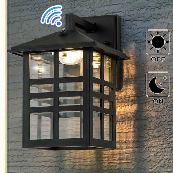 C Cattleya 1-Light Black Dusk to Dawn LED Outdoor Wall Lantern Sconce with Clear Glass Shade