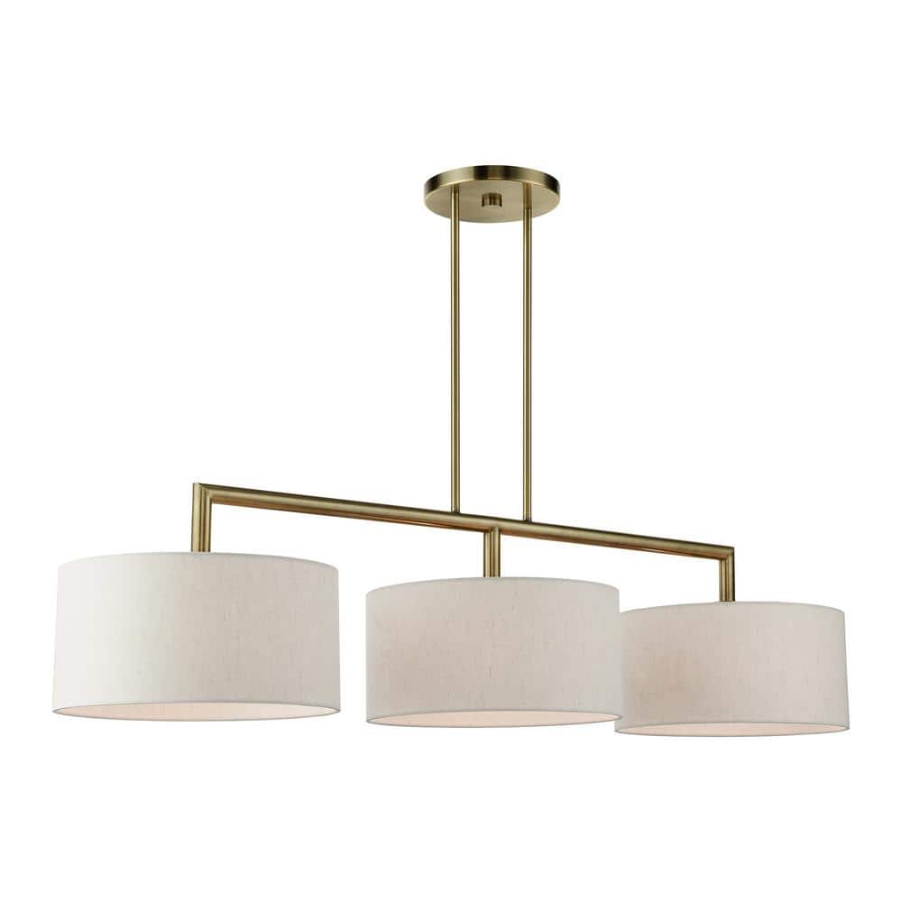 Meridian Antique Brass 3-Light Linear Chandelier with Oatmeal Shades