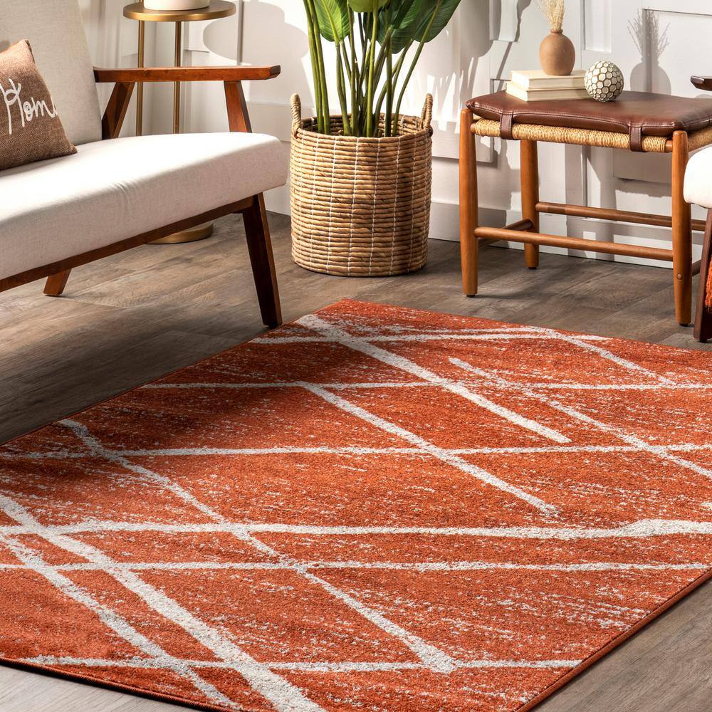 Thigpen Dark Orange and White Synthetic 4' x 6' Area Rug