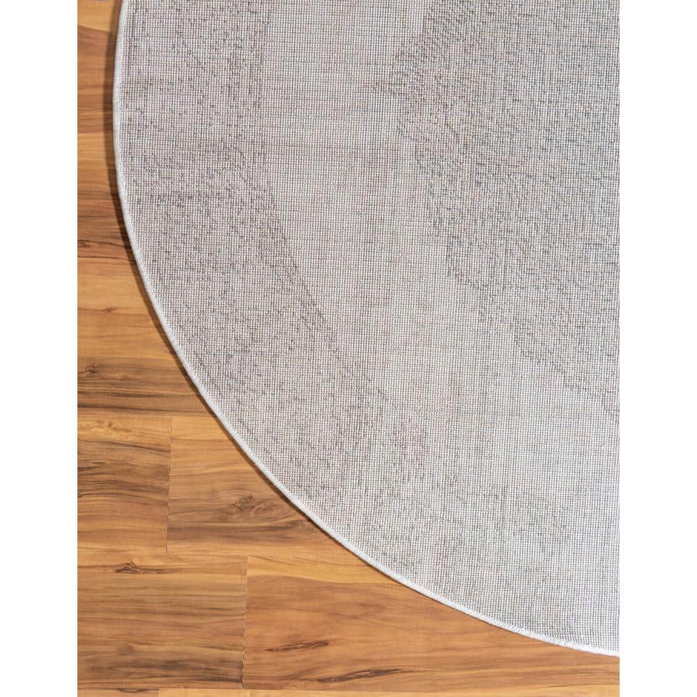Ivory Round Polypropylene and Polyester Indoor Rug