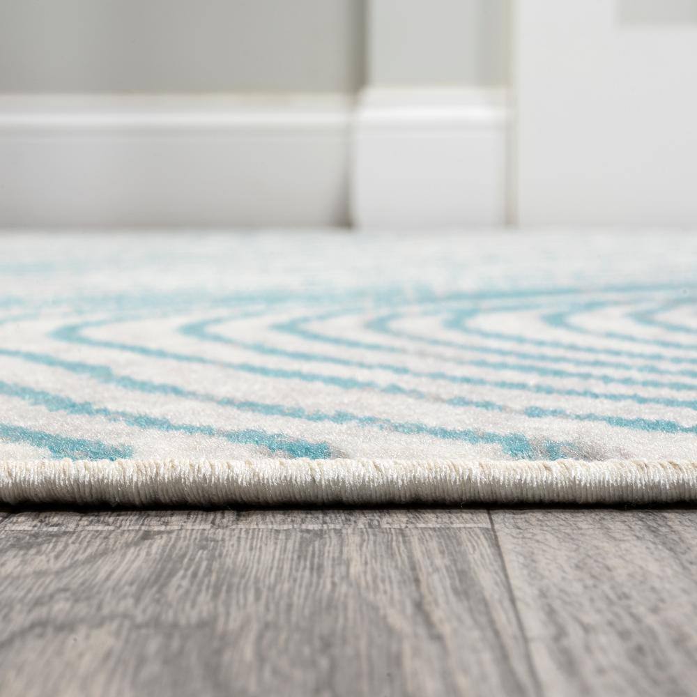 Ivory and Blue Geometric Synthetic 5x8 Area Rug