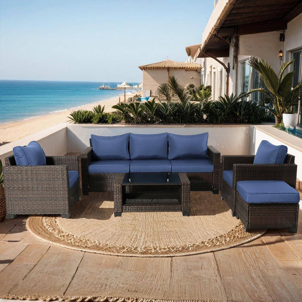 Brown 7-Piece Wicker Outdoor Sectional Set with Dark Blue Cushions and Tabl