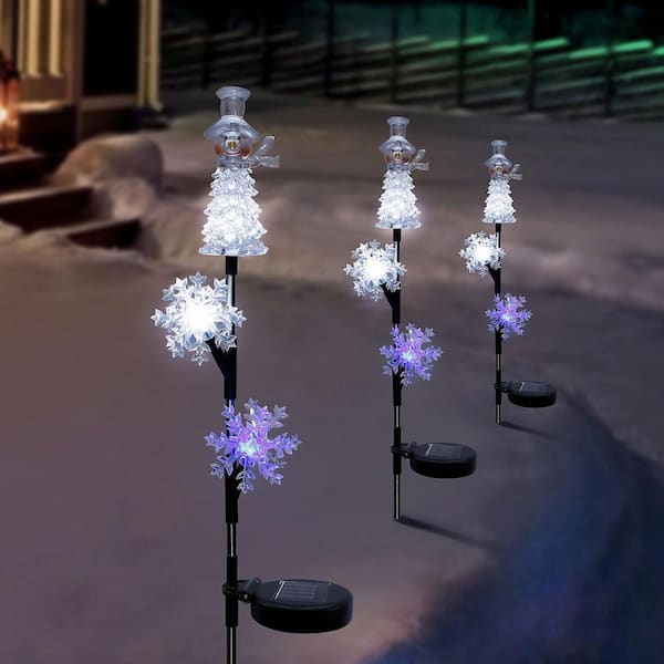 Alpine Corporation Solar Snowman and Snowflakes Stake with LED Lights White