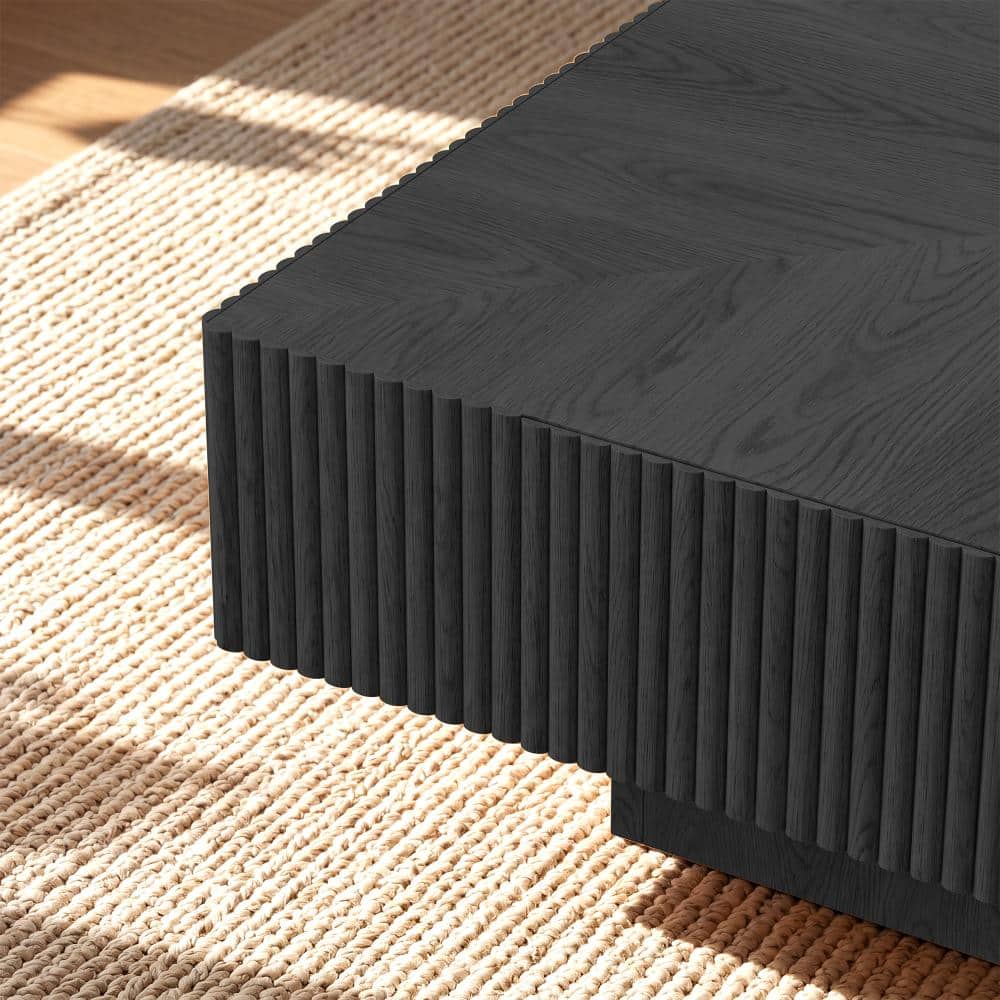 Square dark wood coffee table profile view.