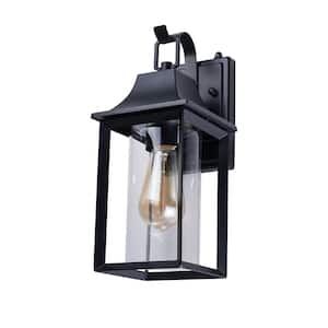 Decorators 14 in. Sand Black Farmhouse Cylinder Dusk to Dawn Outdoor Hardwired Cylinder Glass Sconce