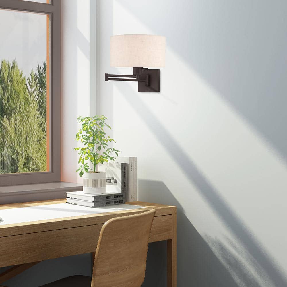 Bronze Swing Arm Wall Lamp with Oatmeal Shade