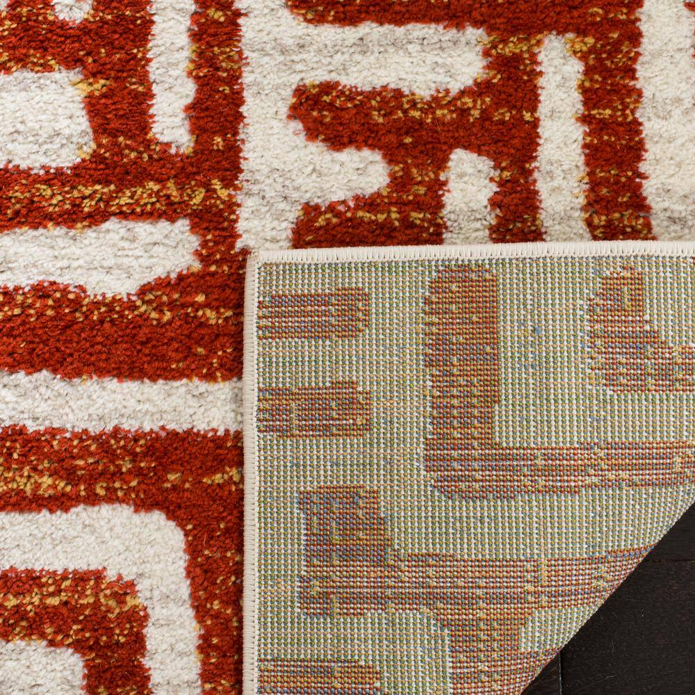 Ivory and Terracotta Geometric Synthetic Area Rug, 5' x 8'