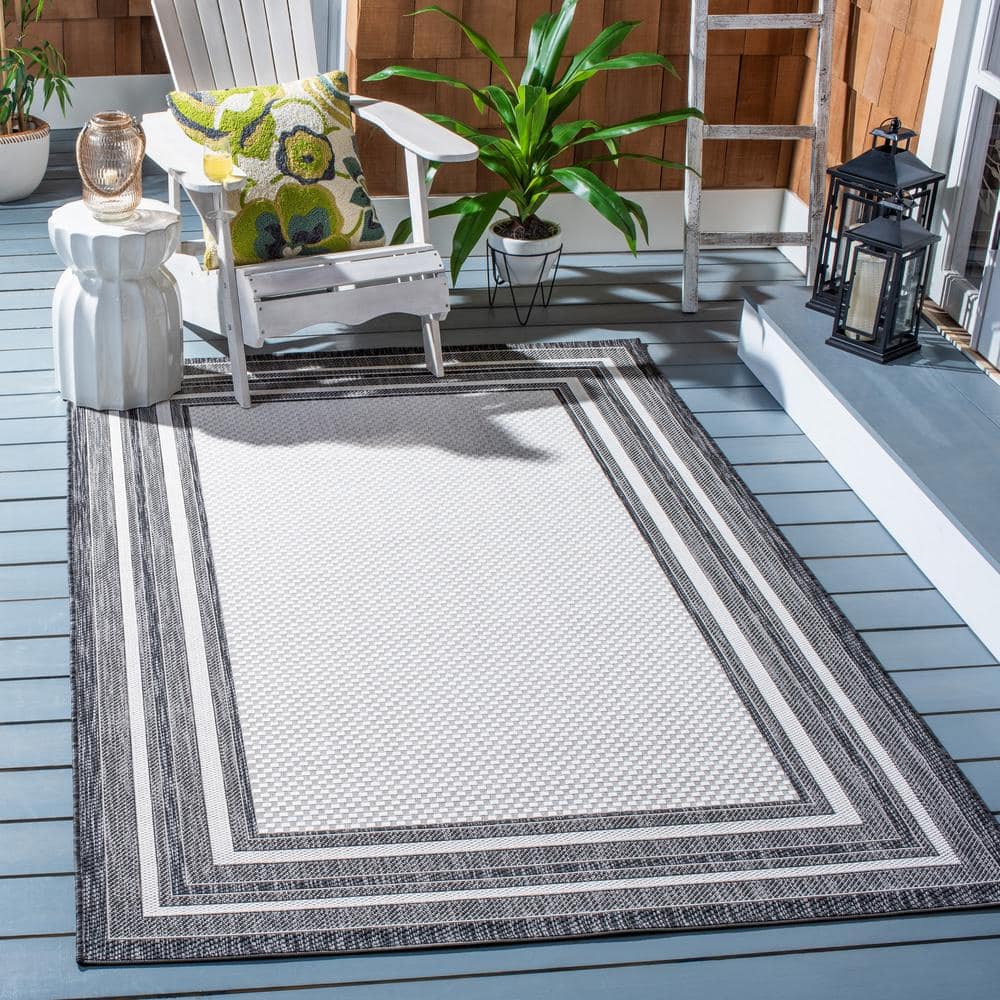 Ivory and Black Reversible Square Synthetic Indoor/Outdoor Rug