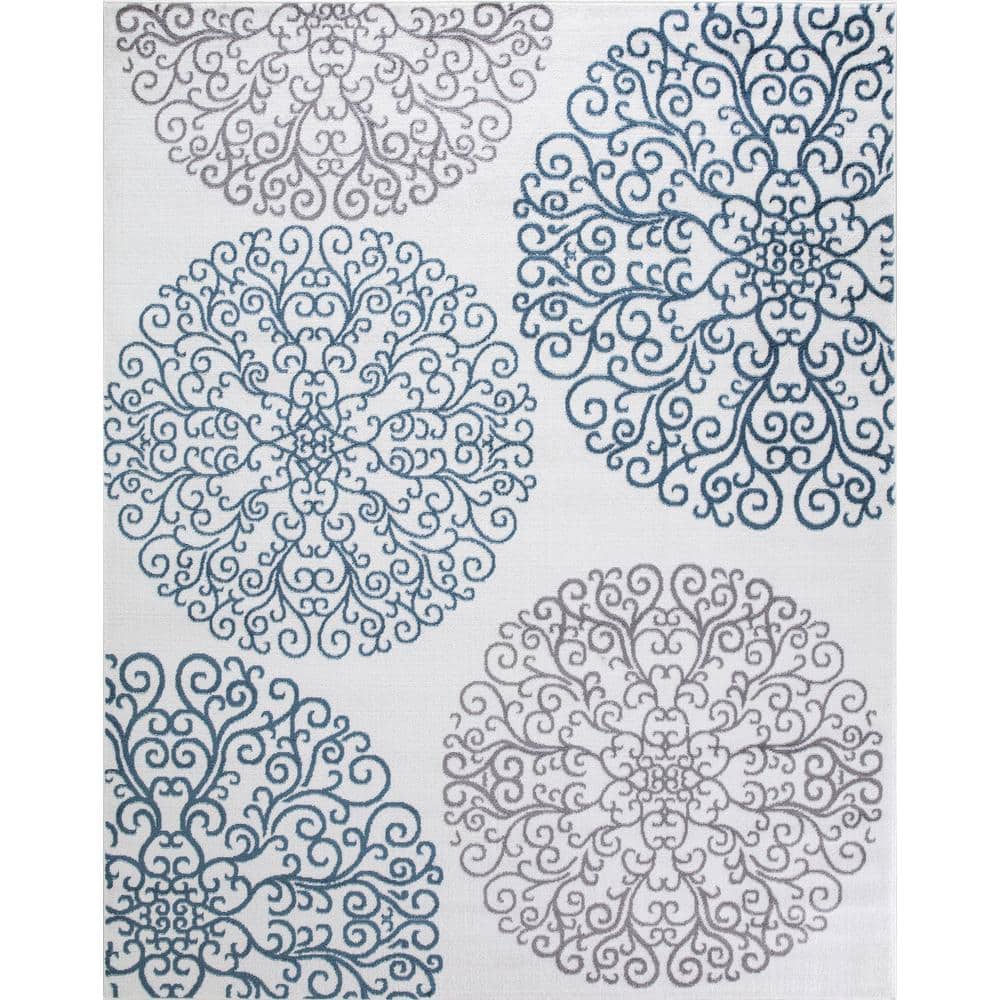 Ivory Elegance 5'3" x 7'3" Synthetic Medallion Area Rug