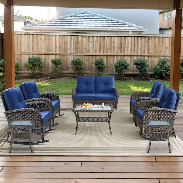 Brown 8-Piece Wicker Patio Conversation Set with Swivel Rockers, Outdoor Glider Seating Set with Navy Blue Cushions