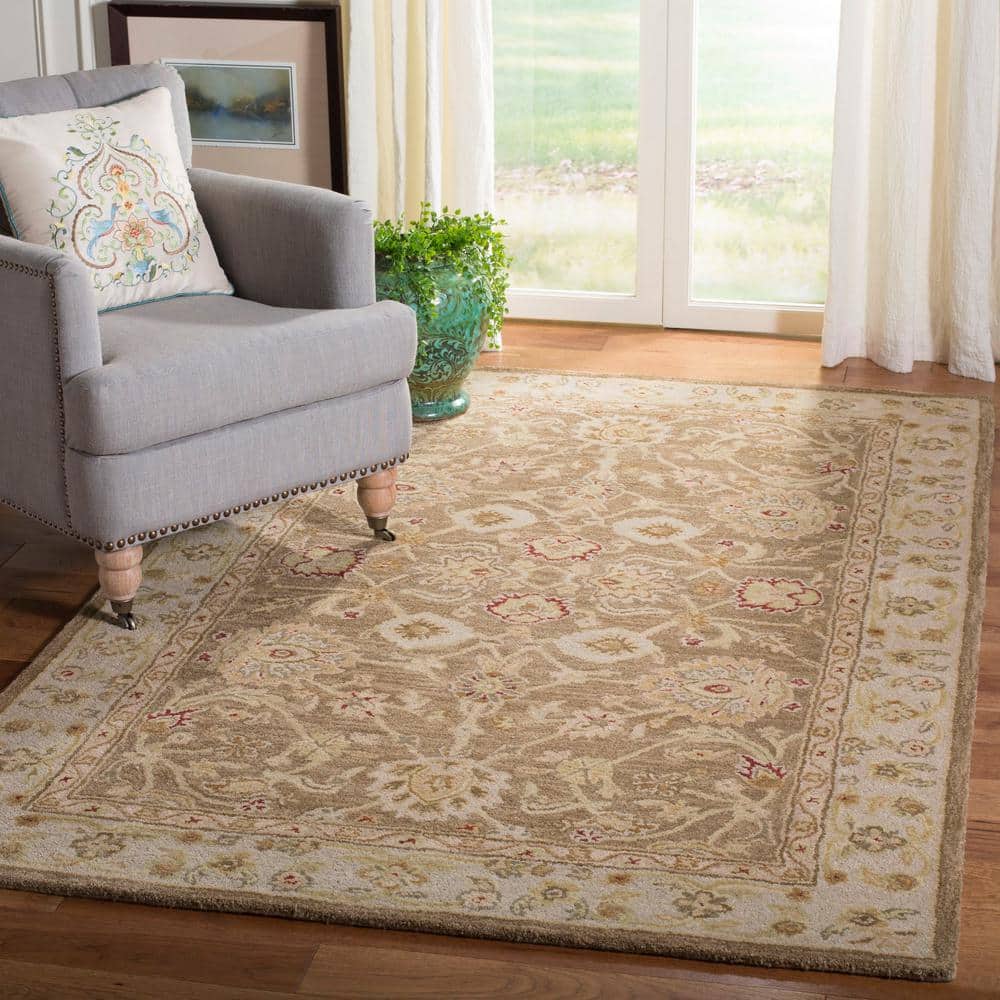 Handmade Tufted Floral Wool 8' x 10' Tan/Ivory Rug