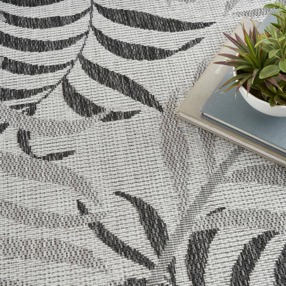 Gray Tropical Leaf Pattern 5' x 7' Synthetic Outdoor Rug