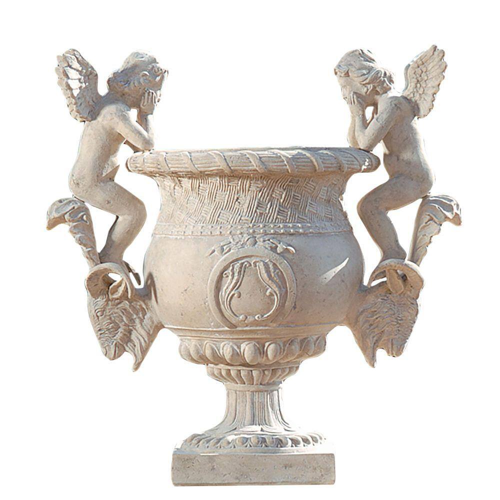 Design Toscano Versailles Cherub 38 in. H Ancient Ivory Fiberglass Garden Urn Replicating the grand design of the court of Versailles, this stunning piece is an artistic, grand-scale, architectural element. Fraught with exquisite detail, it is just as breathtaking displayed alone as filled with your lush greenery. Cast in quality designer resin for year-round display in home or garden, this over 4.50 ft. tall, Design Toscano-exclusive masterpiece boasts an exquisite faux stone finish. Urn arrives in 3 pieces. Urn: 37 in. W x 22 in. D x 38 in. H, 76 lbs. Color: Ancient Ivory.