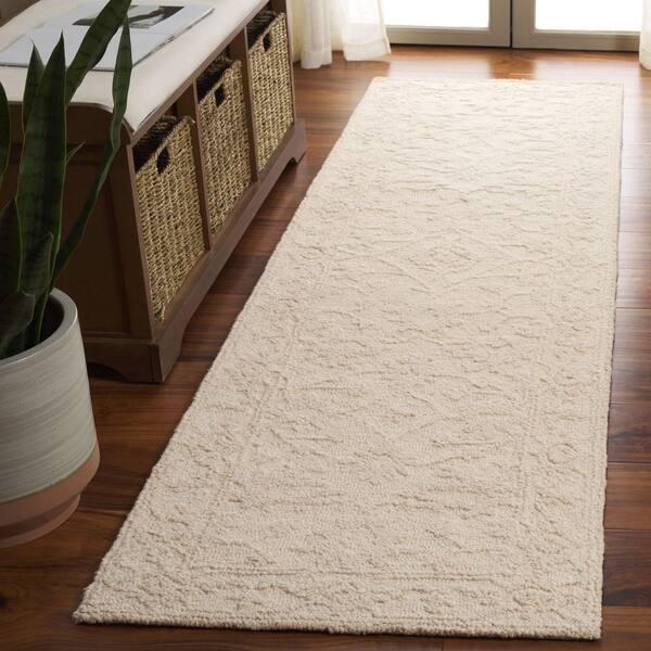 Marquee 2 ft. x 8 ft. Ivory Solid Ornate Border Runner Rug