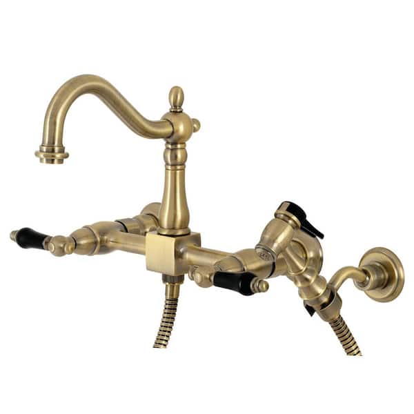 Kingston Brass Duchess 2-Handle Wall-Mount Kitchen Faucet with Side Sprayer in Antique Brass