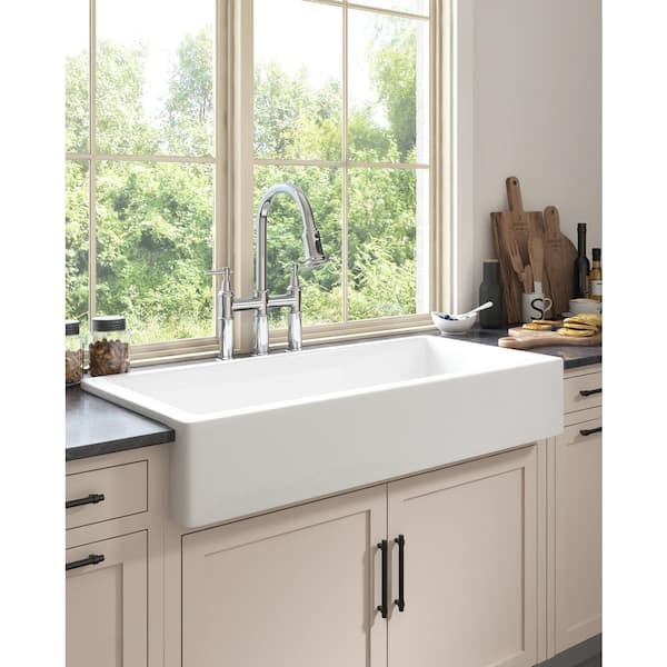 Double Handle Bridge Kitchen Faucet with Pull-Down Spray Head in Spot in Polished Chrome