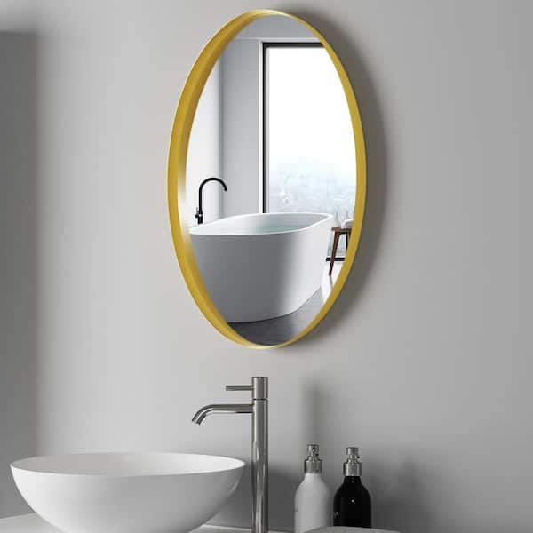 tunuo 18.1 in. W x 27.6 in. H Oval Metal Framed Wall Bathroom Vanity Mirror in Gold