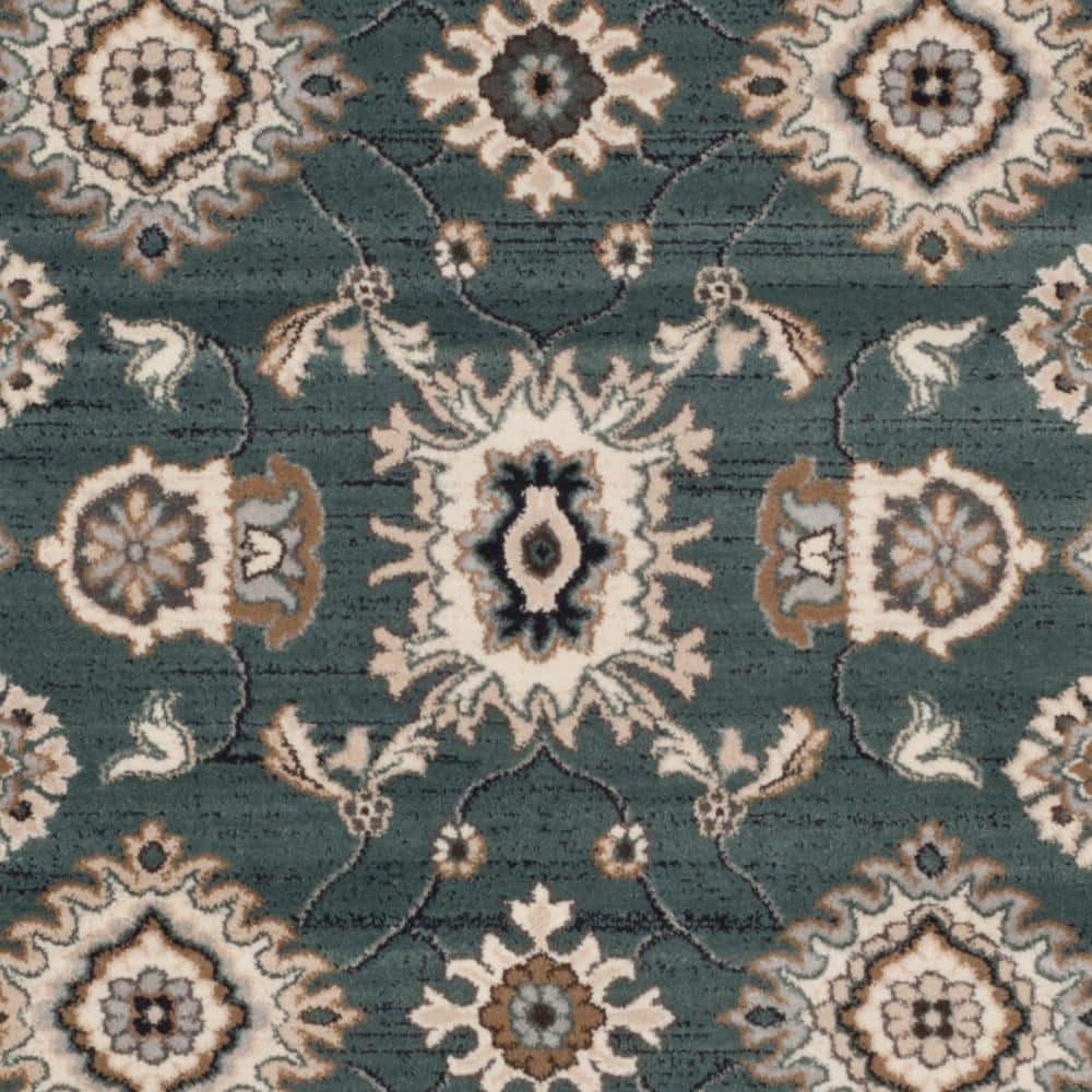Teal and Cream 9' x 12' Floral Synthetic Area Rug