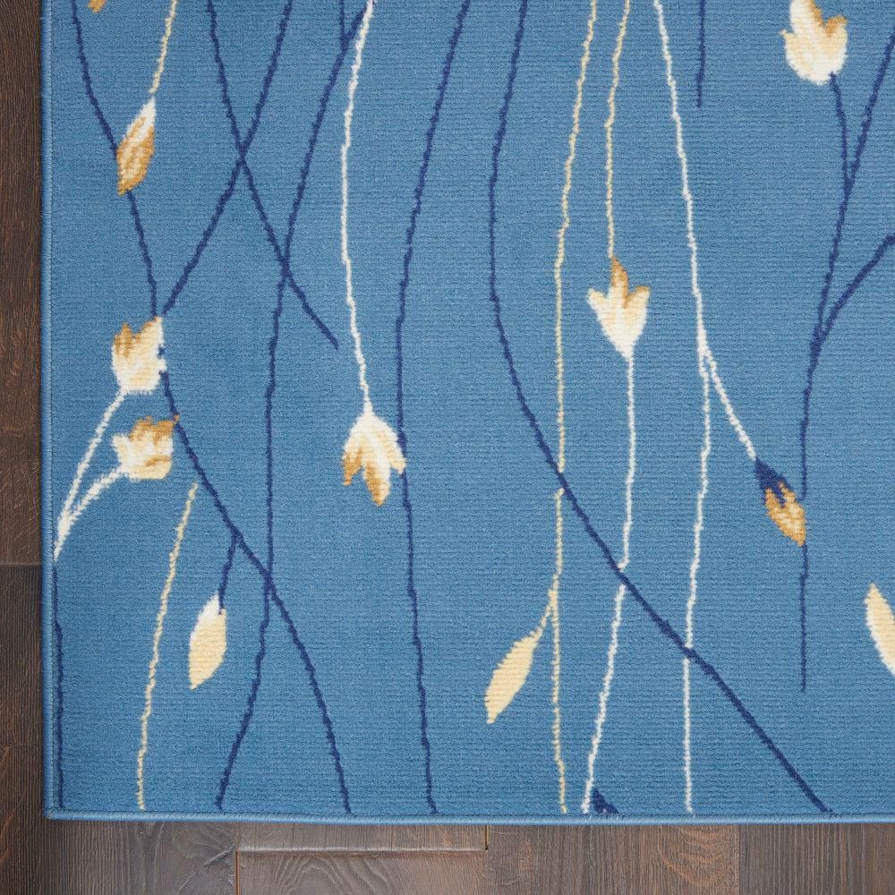 Light Blue Floral Synthetic 5' x 7' Area Rug