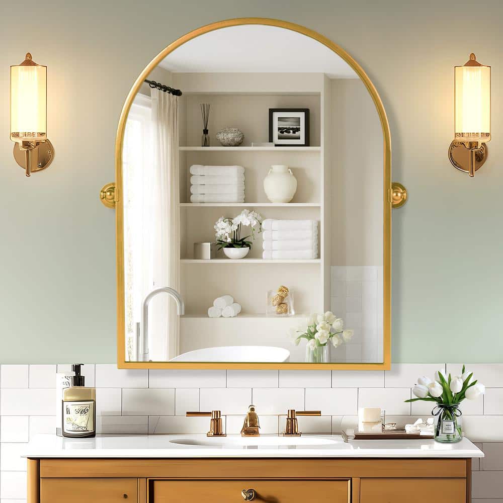 24 in. W x 32 in. H Arched Metal Framed Pivoted Bathroom Wall Vanity Mirror