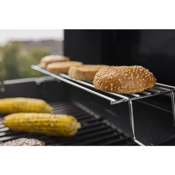 Spirit E-425 4-Burner Liquid Propane Gas Grill in Black with Ruse-Resistant Griddle Insert