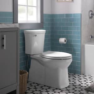 Valiant 12 in. Rough In 2-Piece 1.28 GPF Single Flush Elongated Toilet in White Seat Included