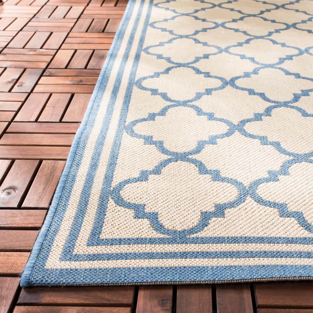 Cream and Blue Geometric Synthetic Indoor/Outdoor Area Rug