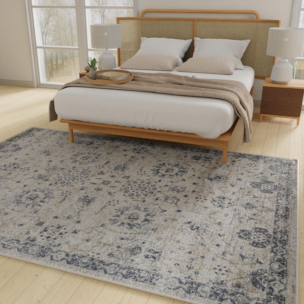 Kehleigh Aylesh 9' x 12' Blue and Cream Synthetic Area Rug