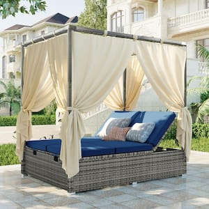 Gray Wicker Outdoor Day Bed with Blue Cushions with Canopy