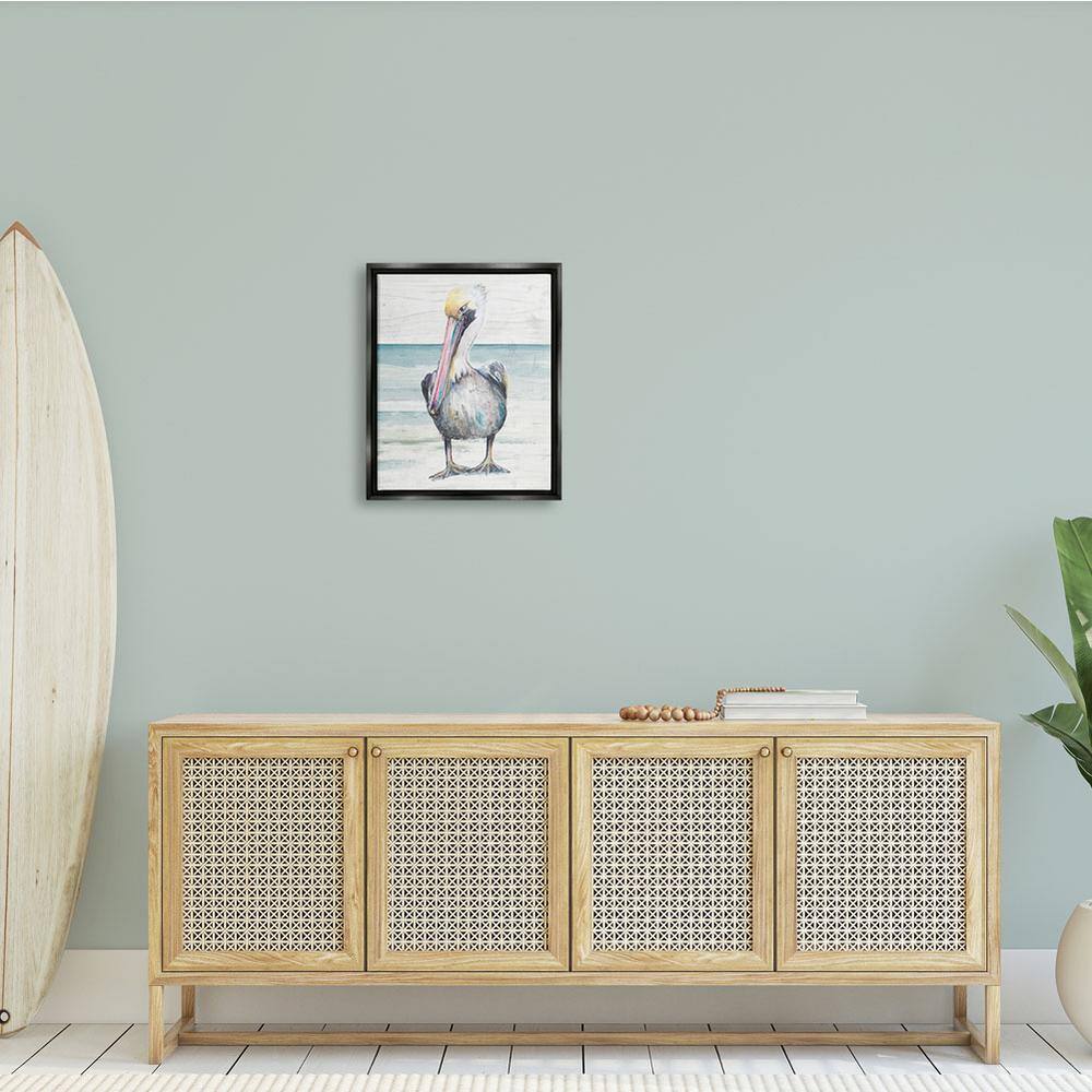 Pelican Bird Standing Beach Canvas Print in Black Frame