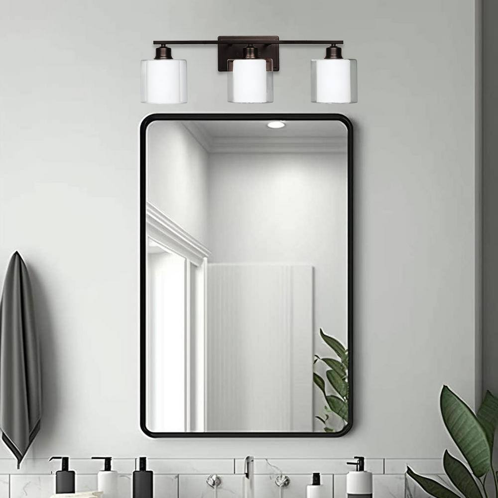 24.75" Oil-Rubbed Bronze Vanity Light with White Glass Shades