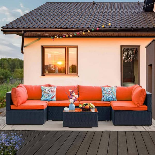 7-Piece Black Wicker Outdoor Sectional Set with Orange Cushions and Coffee Table for Patio Backyard
