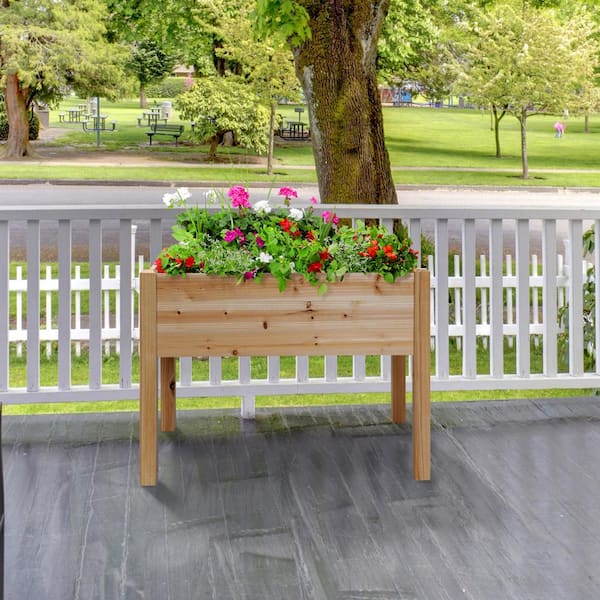 https://images.thdstatic.com/productImages/6532a0ce-233f-43b1-800f-62f4df50363e/svn/natural-cedar-outdoor-essentials-elevated-garden-beds-472541-e1_600.jpg