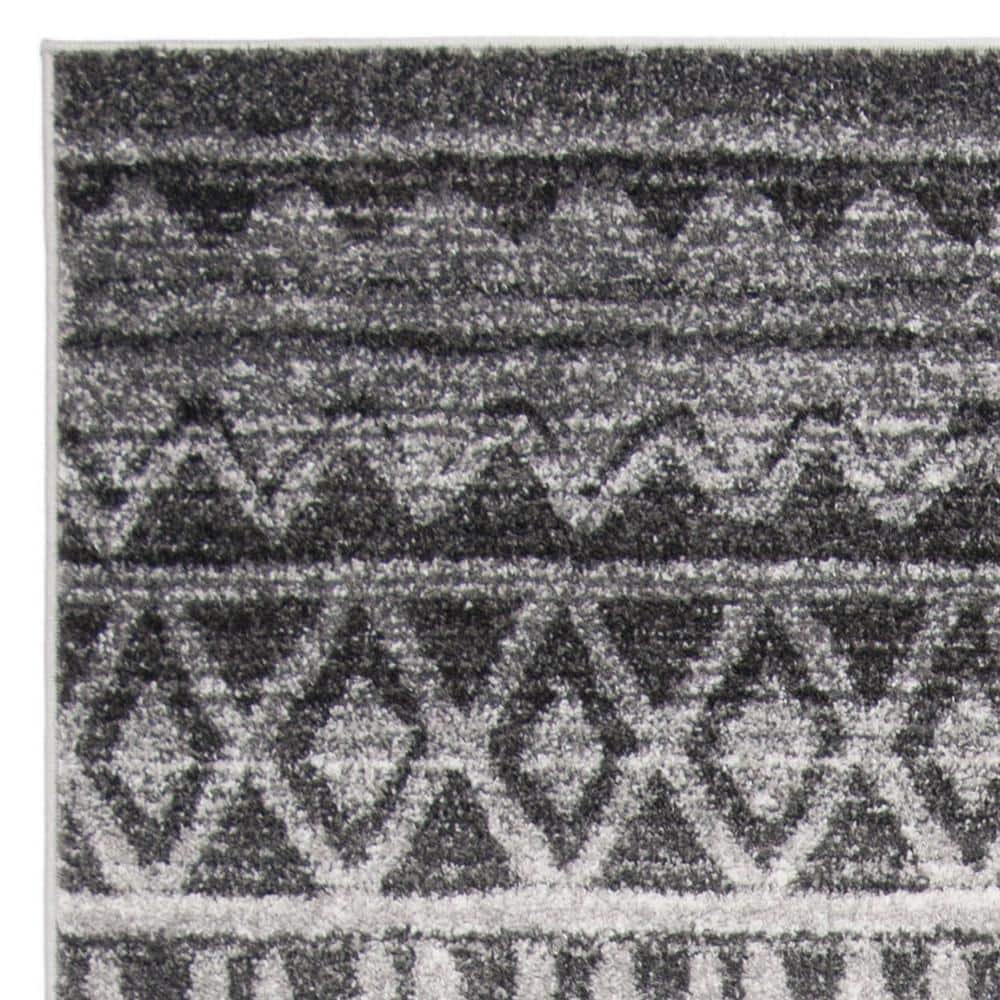 Ivory and Charcoal 6' x 9' Hand-knotted Synthetic Area Rug