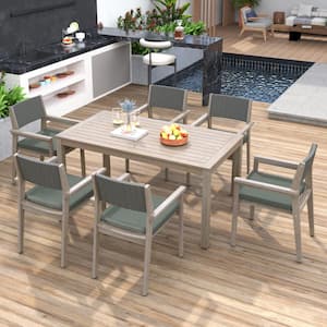 White Washed 7-Piece Wood Outdoor Dining Set with Rattan Backrest and Grayish Green Cushions