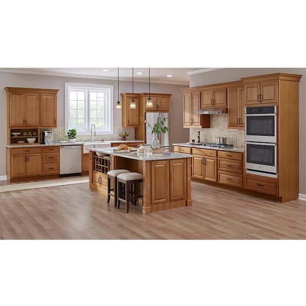 https://images.thdstatic.com/productImages/655eef93-09b5-4903-856d-394763a4e8d6/svn/medium-oak-hampton-bay-assembled-kitchen-cabinets-kb30-mo-1f_600.jpg