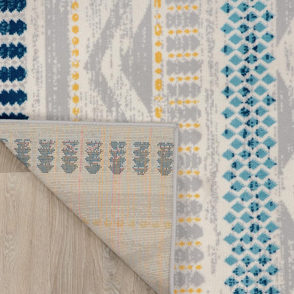 Boho Blue Geometric Tufted Synthetic Area Rug