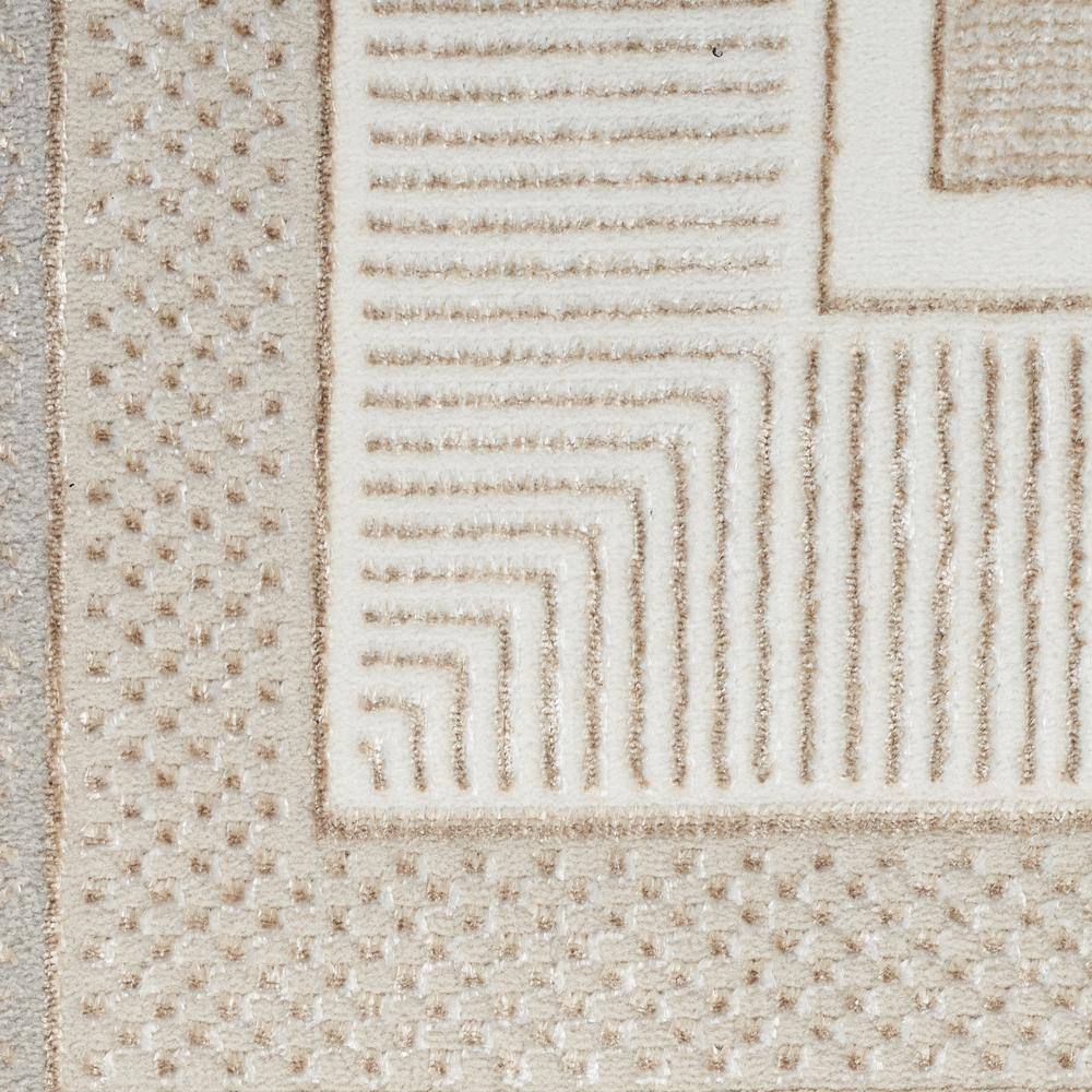 Ivory Geometric 8' x 10' Synthetic Rectangular Area Rug