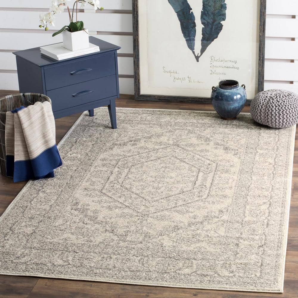 Elegant Ivory and Silver 12' Square Synthetic Easy-Care Rug