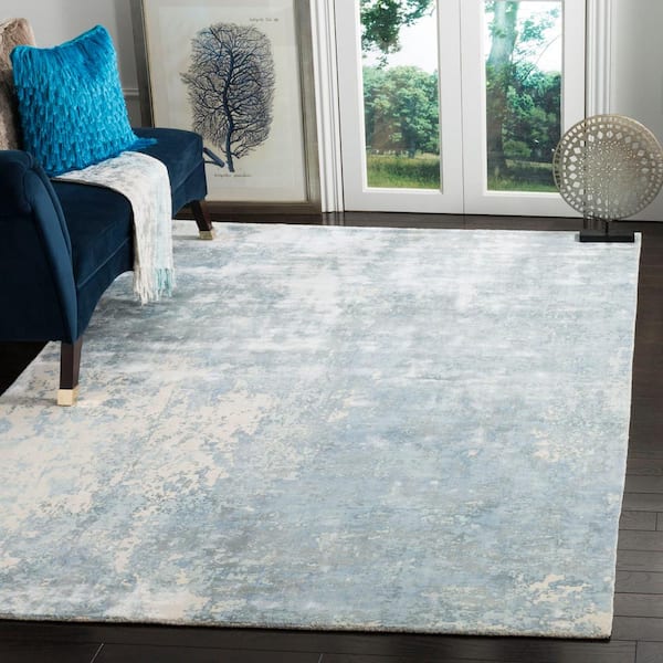 Mirage 10 ft. x 14 ft. Aqua Abstract Distressed Area Rug