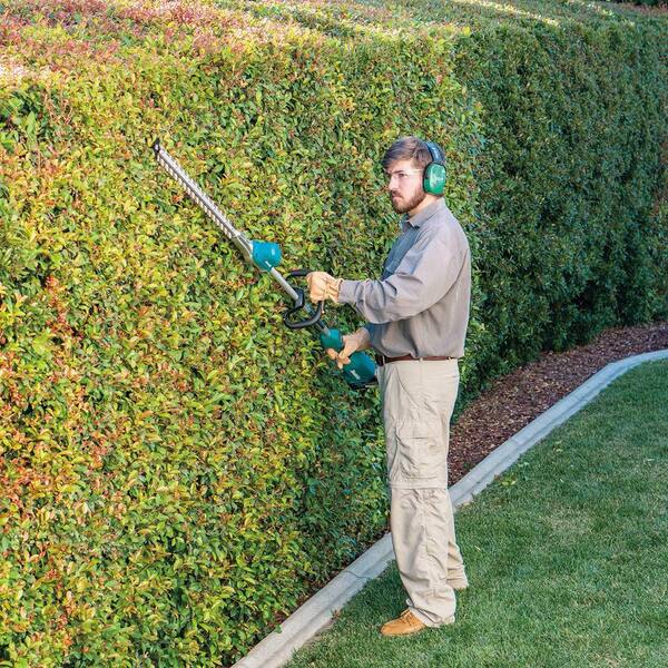 Makita LXT 18V Brushless 24 in. Pole Hedge Trimmer Kit (5.0 Ah) with bonus  LXT 18V Lithium-Ion High Capacity Battery Pack 5.0Ah XNU02T-BL1850B - The  Home Depot