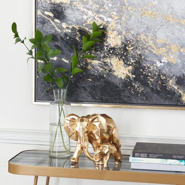 CosmoLiving by Cosmopolitan 10 in. x 8 in. Gold Resin Elephant Sculpture