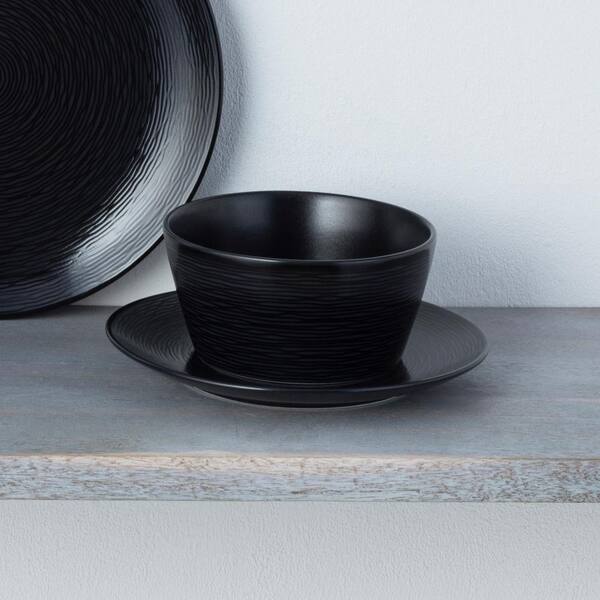 https://images.thdstatic.com/productImages/65b603a2-a645-4637-95a4-bb06e388e424/svn/black-noritake-dinnerware-sets-43817-04p-c3_600.jpg