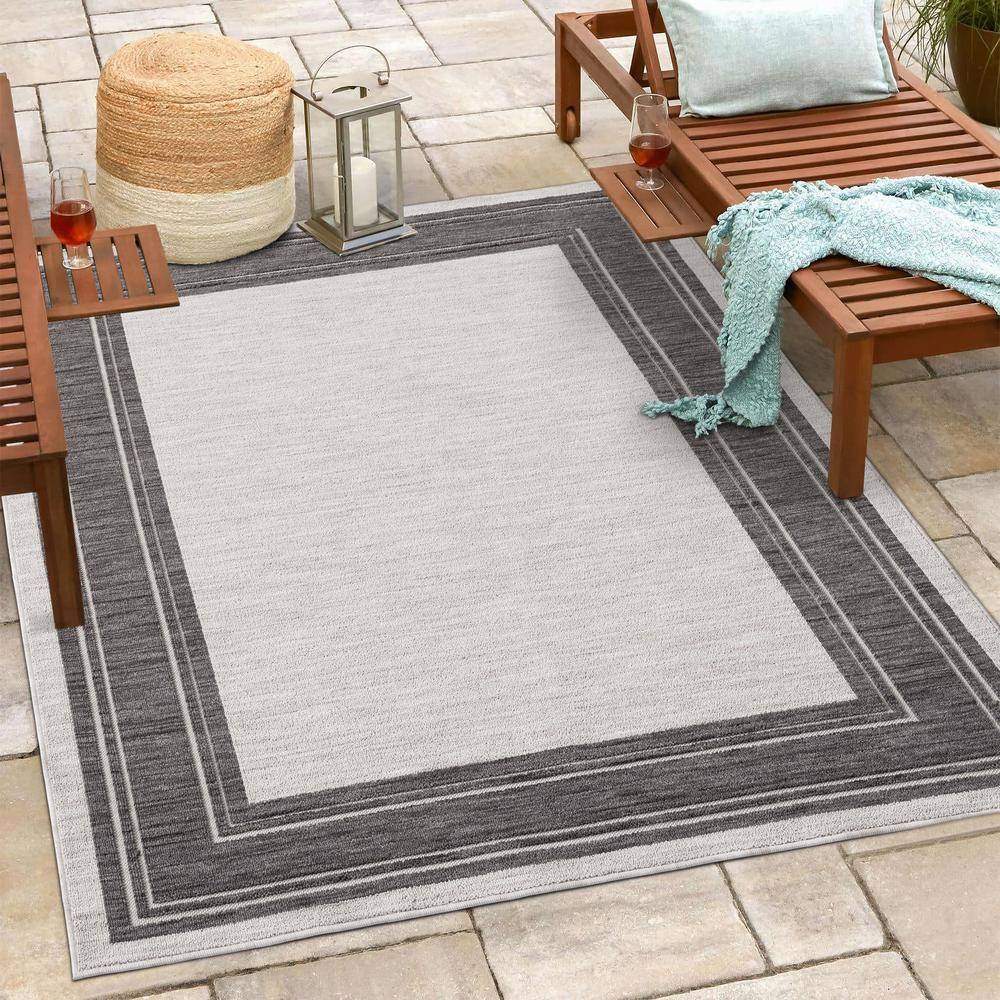 Winona 5' x 7' Ivory Rectangular Synthetic Area Rug