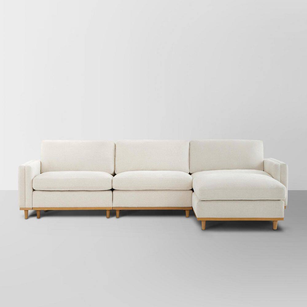 Spruce & Spring Aria 4-piece fabric modular sectional sofa in linen on a plain background.