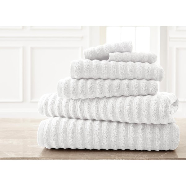 https://images.thdstatic.com/productImages/65dccb6b-a735-41ac-a5a8-b3bdbb0aaeb5/svn/white-modern-threads-bath-towels-5wvyspag-wht-st-64_600.jpg