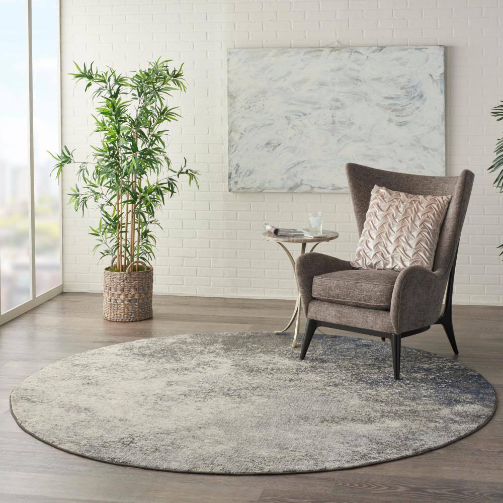 Large Round Gray and Ivory Synthetic Traditional Rug