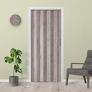 Neptune 36 in. x 80 in. American Oak Texturized Surface PVC Accordion Door with Hardware
