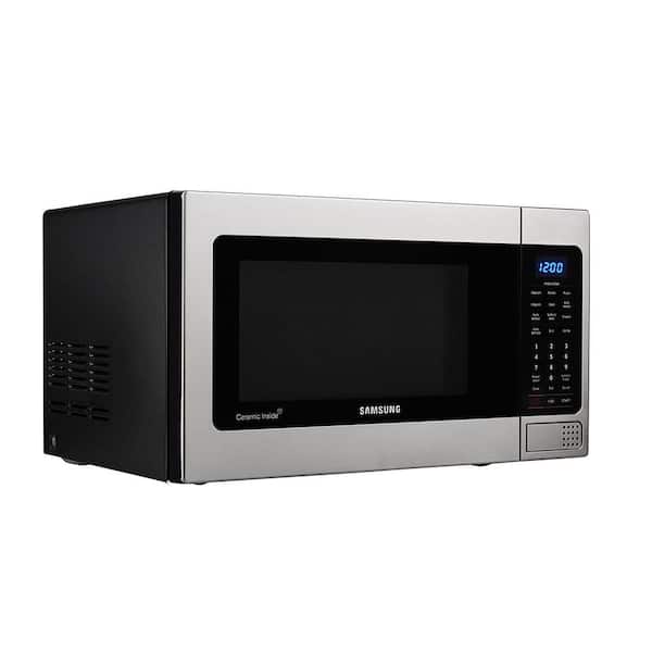 https://images.thdstatic.com/productImages/65ef3398-b484-495d-884d-81c990571e62/svn/stainless-steel-samsung-countertop-microwaves-mg11h2020ct-1d_600.jpg