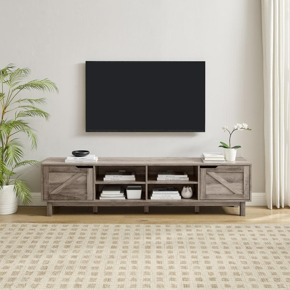 Welwick Designs 70 in. Grey Wash Wood Modern Farmhouse TV Stand with 2 Barndoors Fits TVs up to